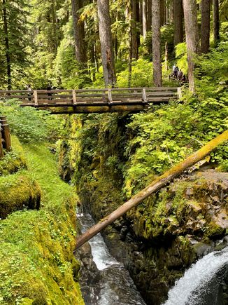There is a nice bridge over the waterfall which is generally packed.