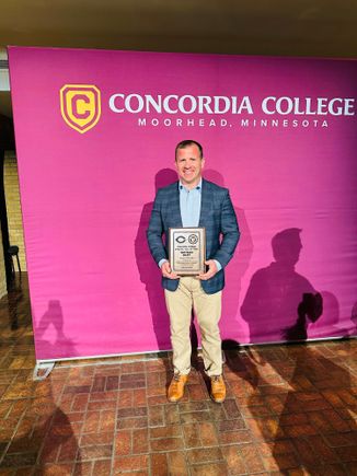 Hall of Fame Inductee for football and wrestling.