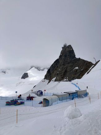 At the start of our hike to Mönchsjochhütte, looking back at the Sphinx Observatory still shrouded in clouds