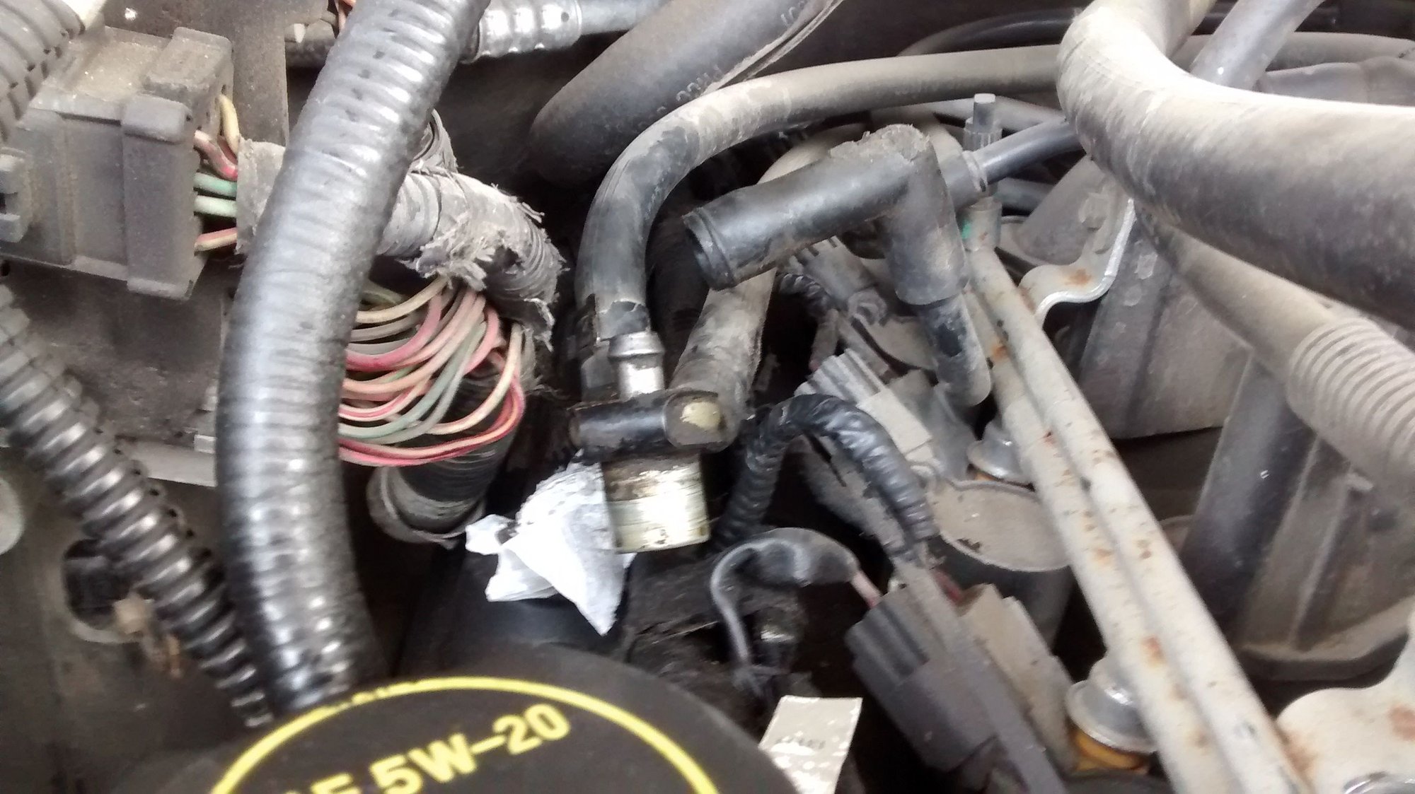 How to remove heated pcv from coolant bracket Ford Truck Enthusiasts