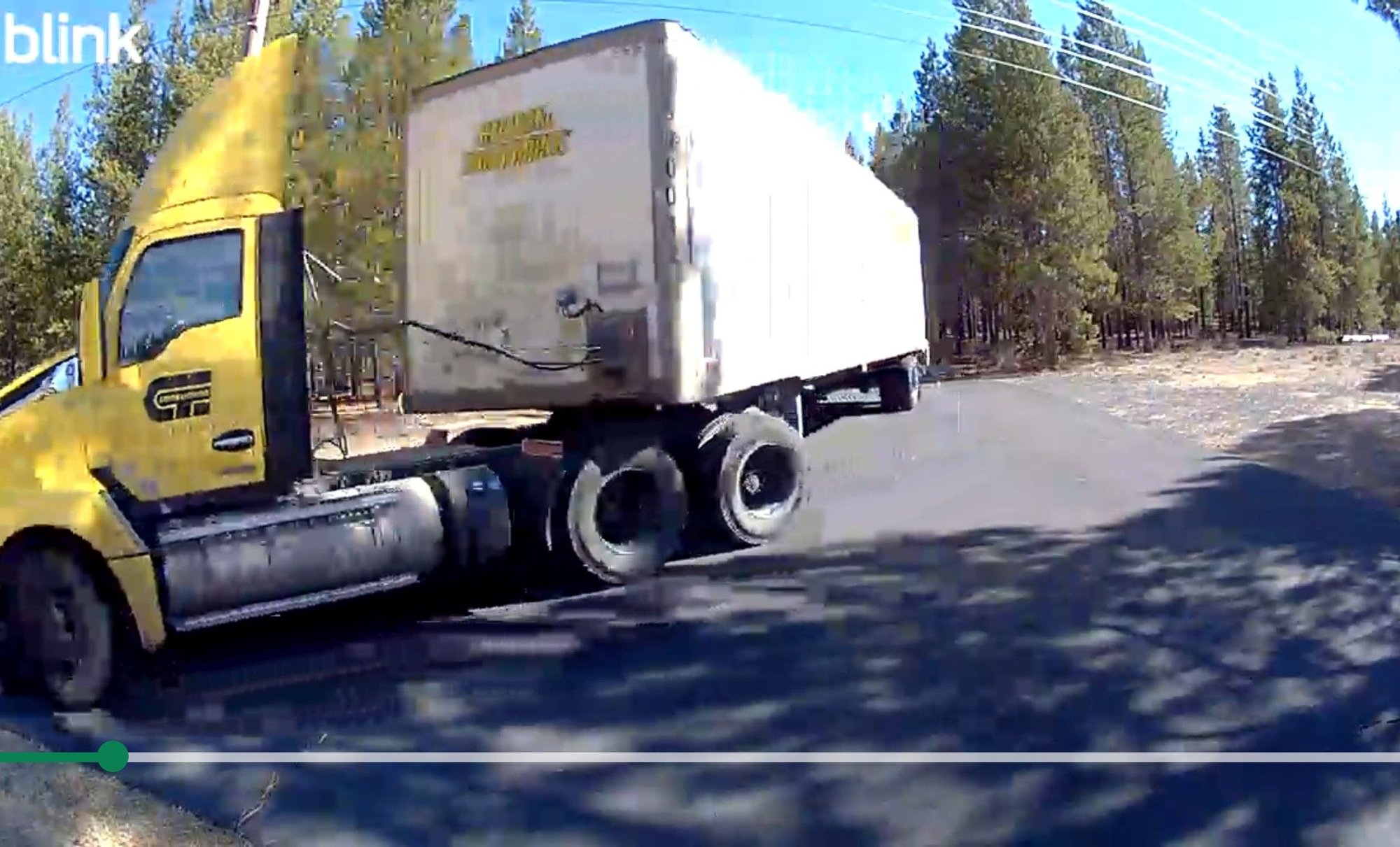Truck coming onto the driveway off of our private lane.  Big trailer for a little 1800# safe.