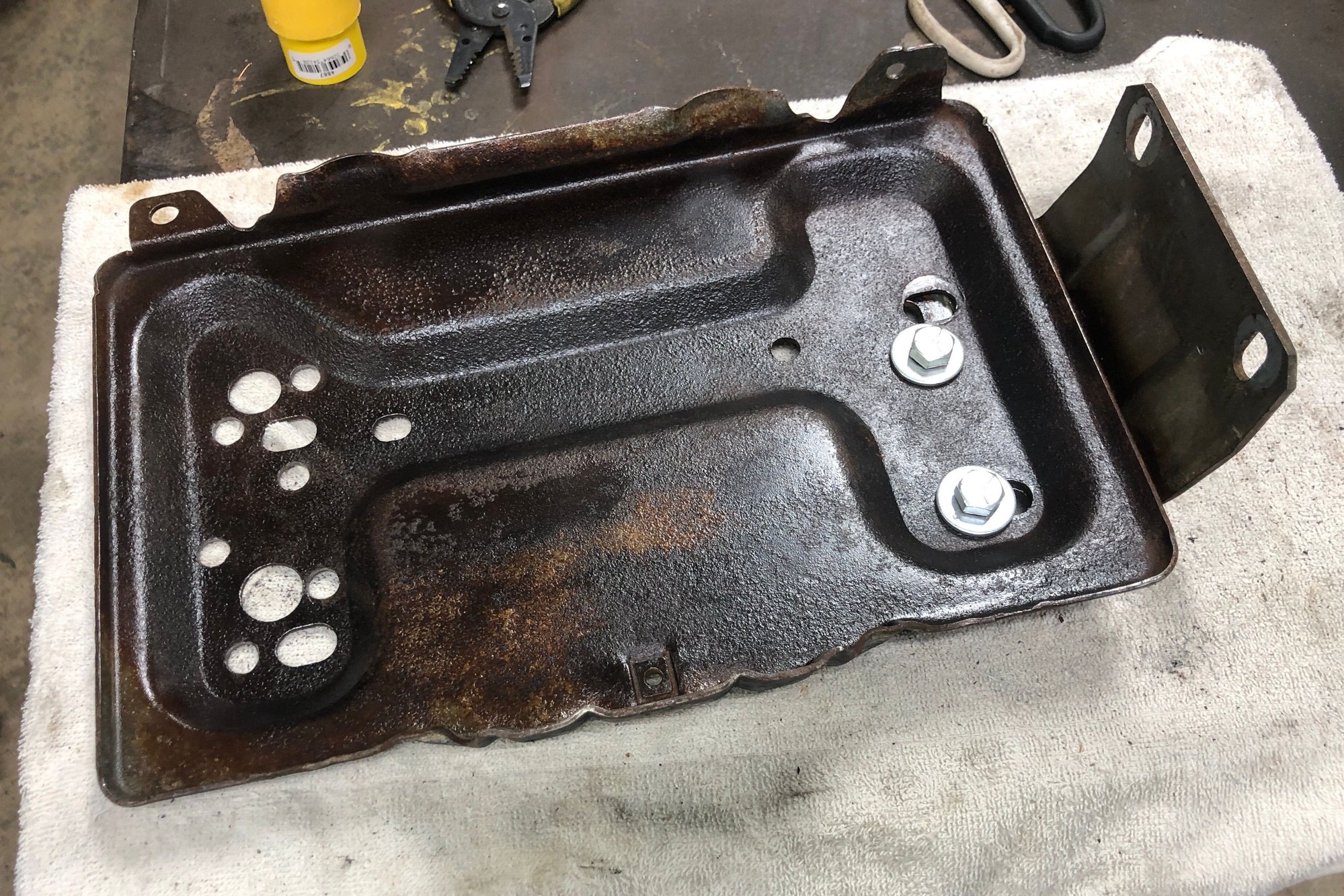 I went with 3/8 x 3/4 for the tray to mount bolts with a nylock nut on the bottom. Still needs a coat of paint. 
