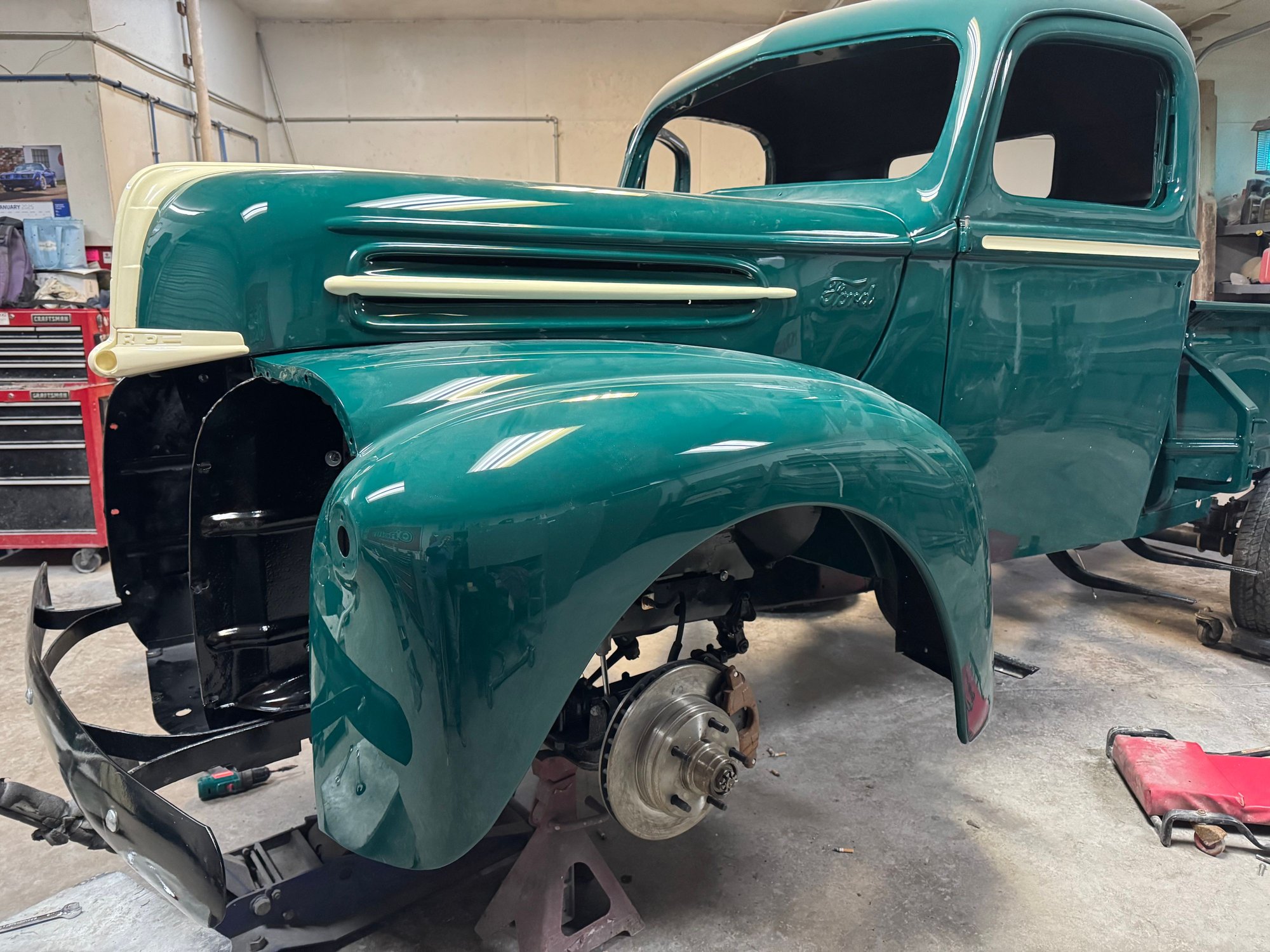1946 Ford 1/2 ton 239 flathead V-8, with modern shocks, brakes, T-5 transmission and narrowed 1975 F-150 rear end.  I wanted a real driver that looks absolutely stock, and gets good fuel economy.
