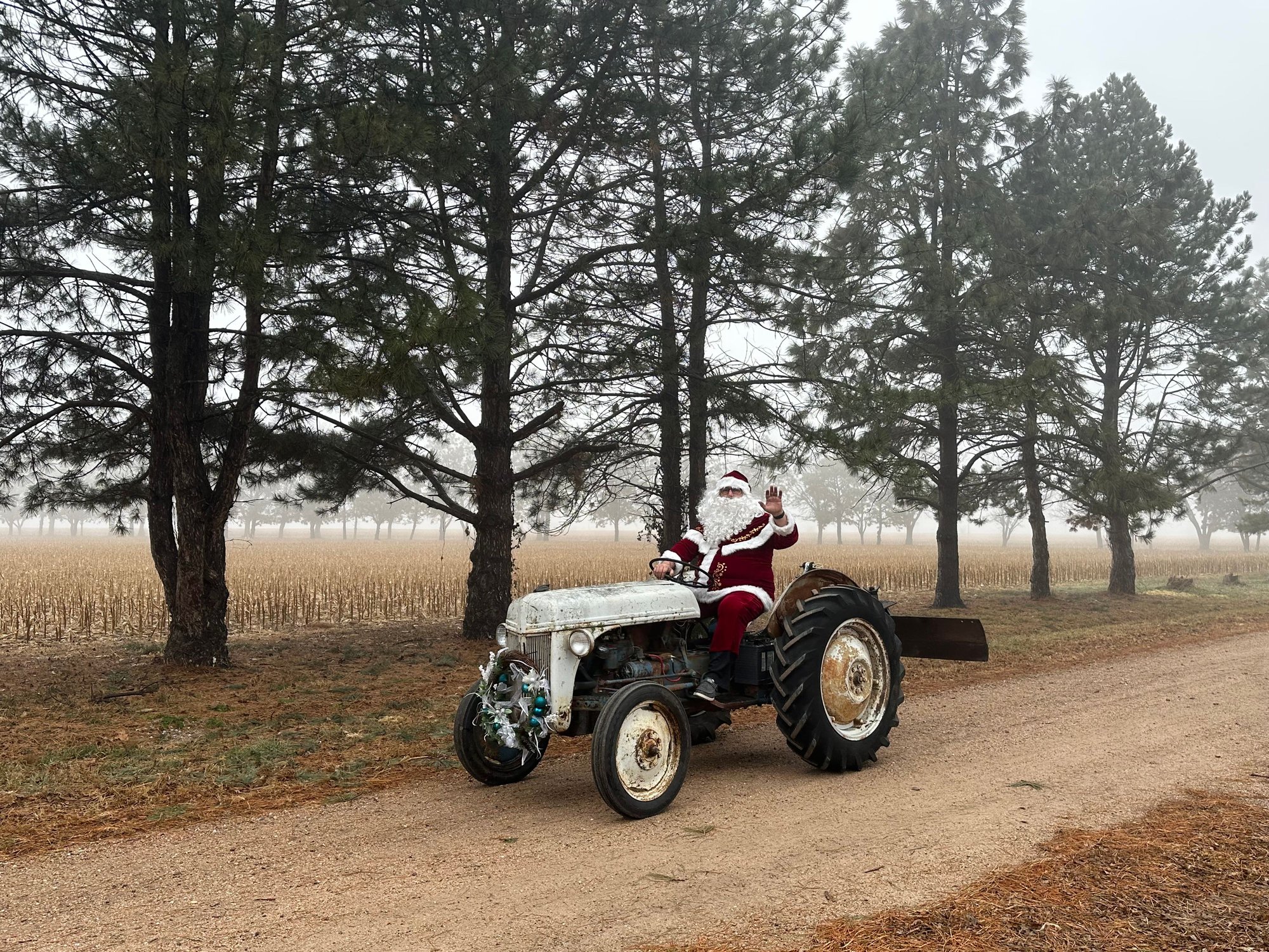 For Christmas a family in town has me dress up as Santa. Last year I was 4 wheeler Santa. This year I was tractor Santa. 