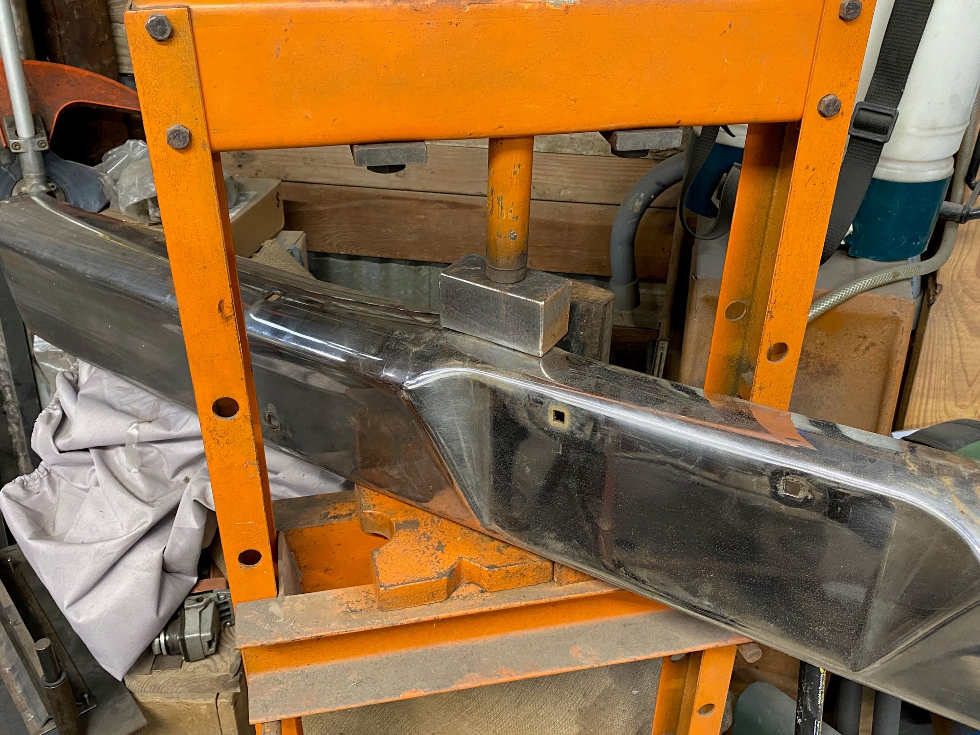 Into the press it goes. 