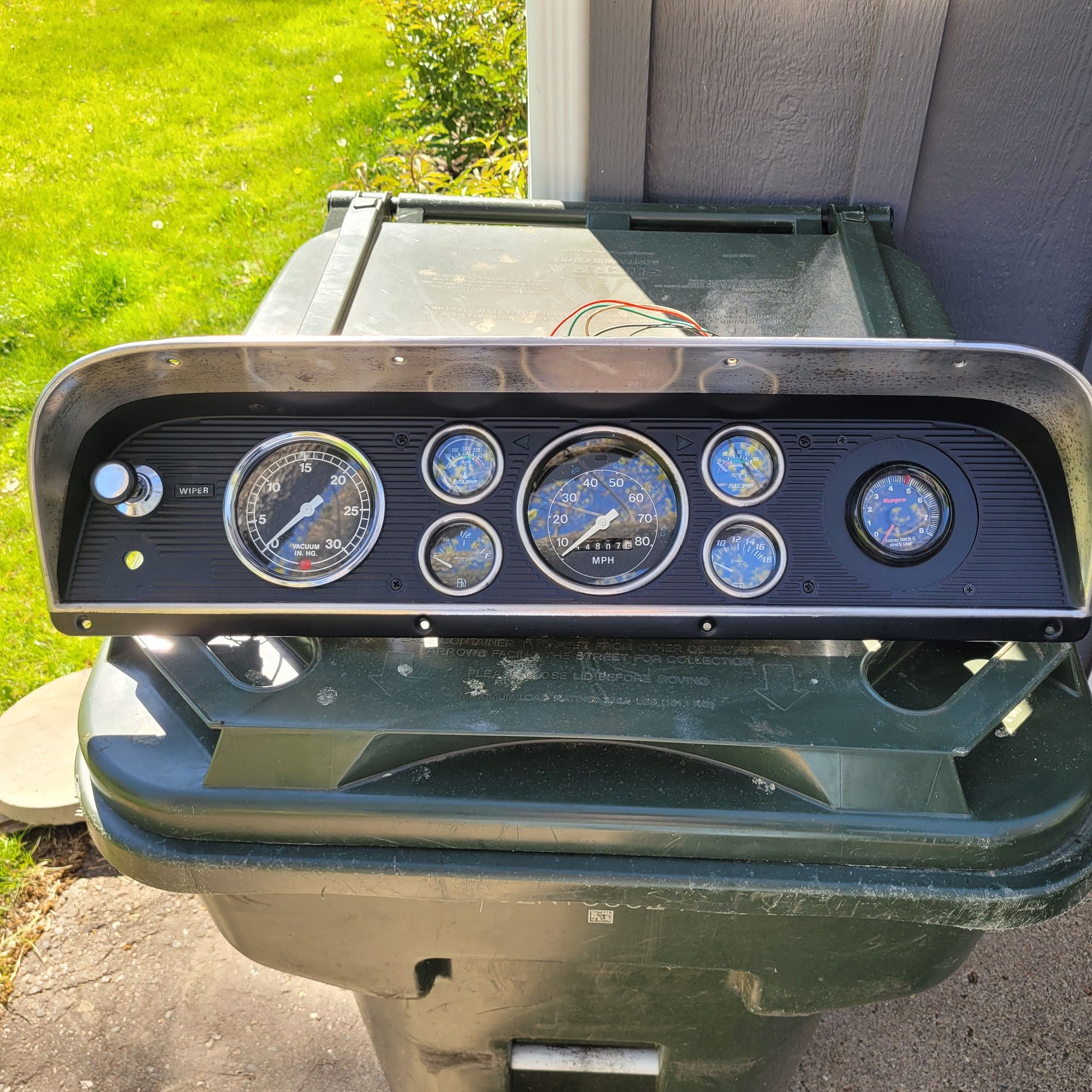 Vacuum gauge, tach and delay wiper switch installed.