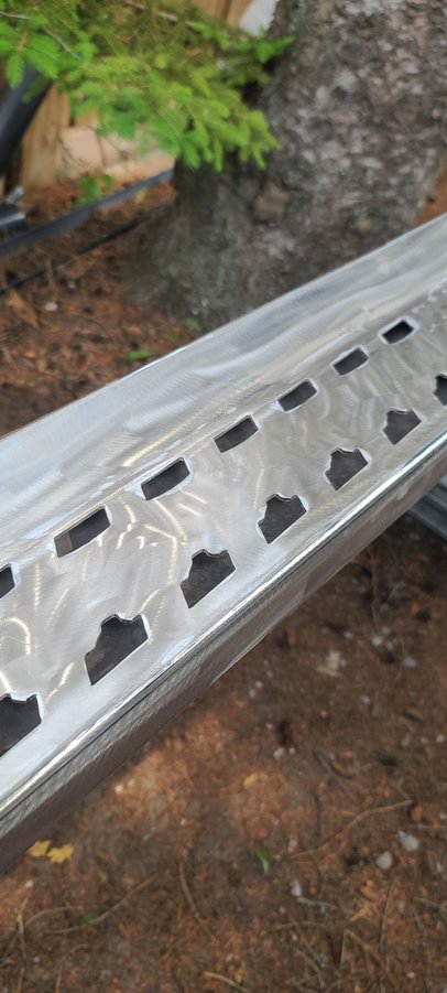 Stripped running boards with 80 grit flap disk on angle grinder