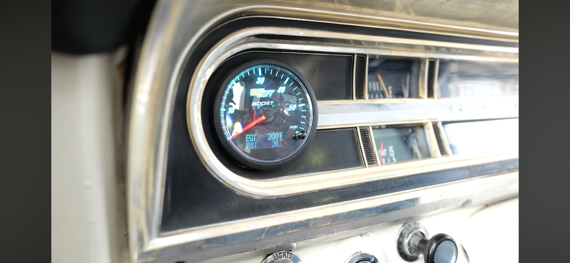 Cutting out the dash and putting the tach in it like this?
