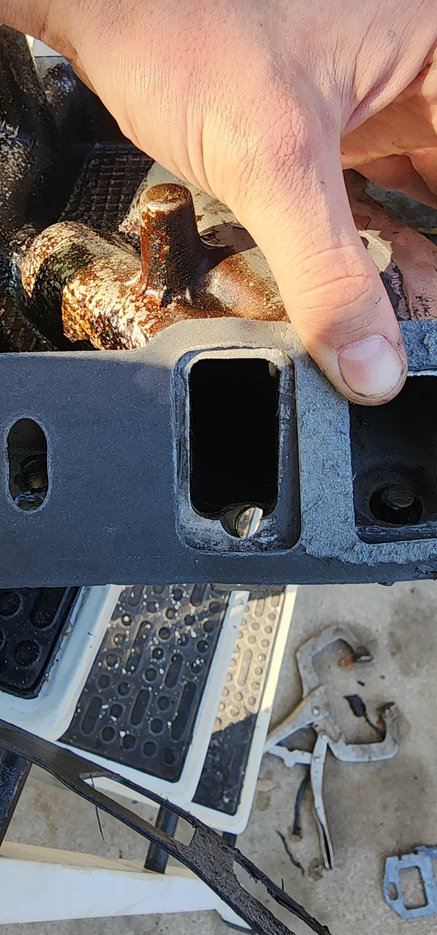 This is a 1262 Gasket over the stock 93 truck intake that I've heard is notorious for poor flow