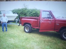 My Grandfather next to my Dad's 86 F150.
