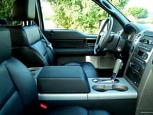This was the interior when found Aug 25, 2009.  I never started out to buy a tyruck with all the power accys and moon roof and back glass and heated seats and .... a console shifter?   

  I have added an XM using the Ford's Sirius antenna and wired in modulator as I have a life sub on it.