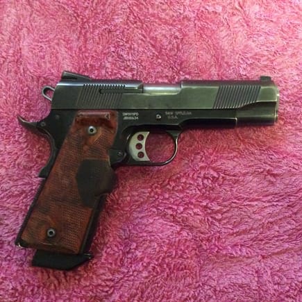 My carry piece...Smith &Wesson Commander size, alloy frame, laser sight, had some trigger work done!