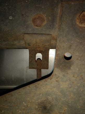 There is just one rivet in this bracket from the bottom going up into the frame.