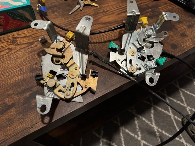 original assembly vs new. original is from left door. new assembly goes to right door (or likely returned)