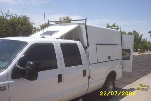 2001 F350 4x4 SD Crew Cab Long Bed
6.0 V-10 Auto
Solar panel powers lights and fan in rear cap
