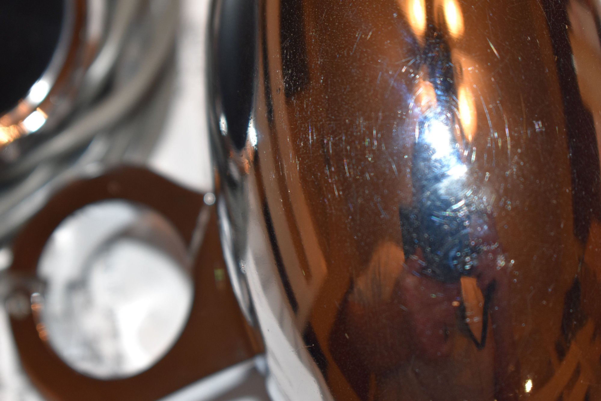 Slight scratches on the chrome cup.