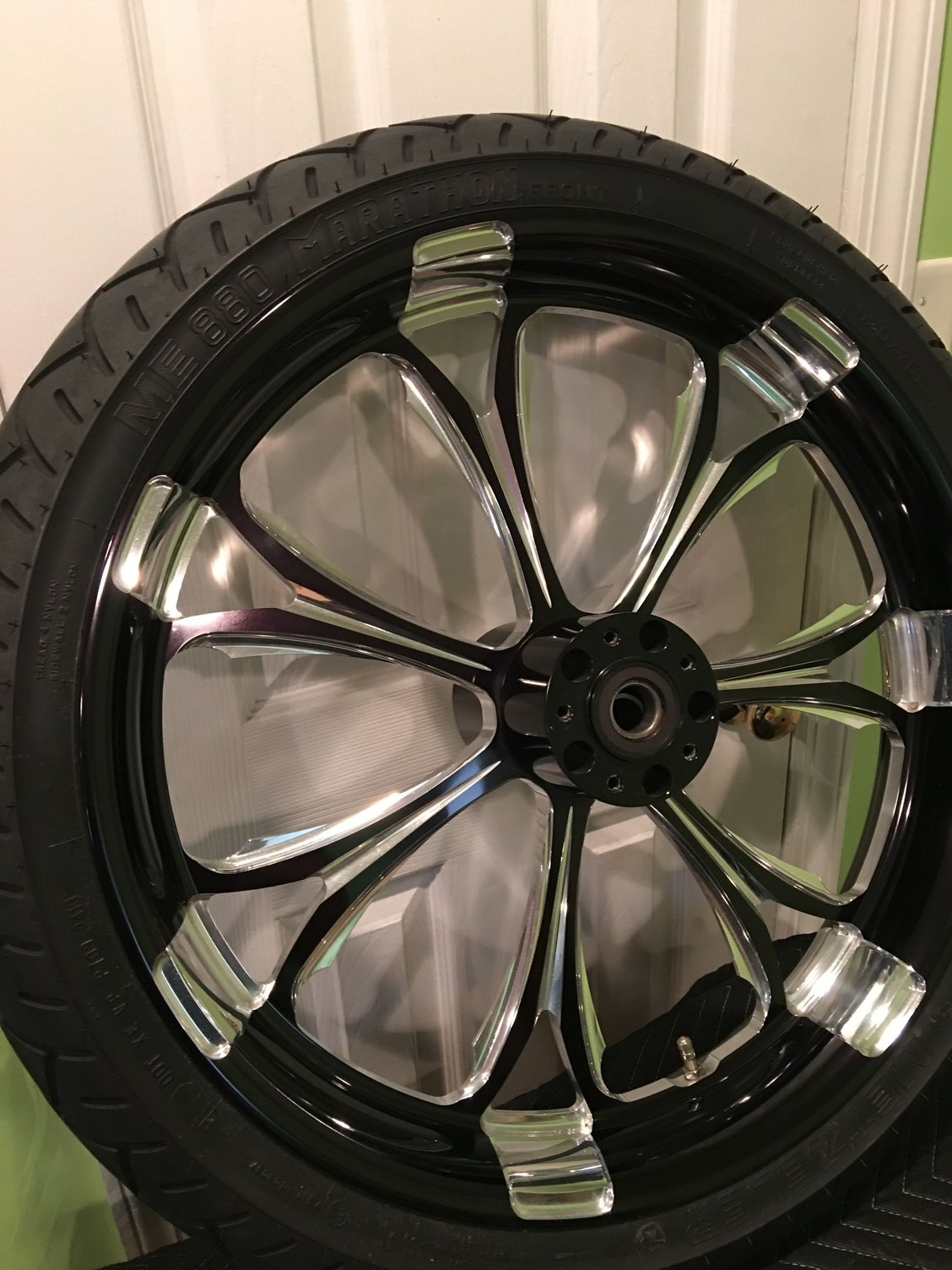 Performance machine 21 platinum cut paramount wheel and tire. Harley