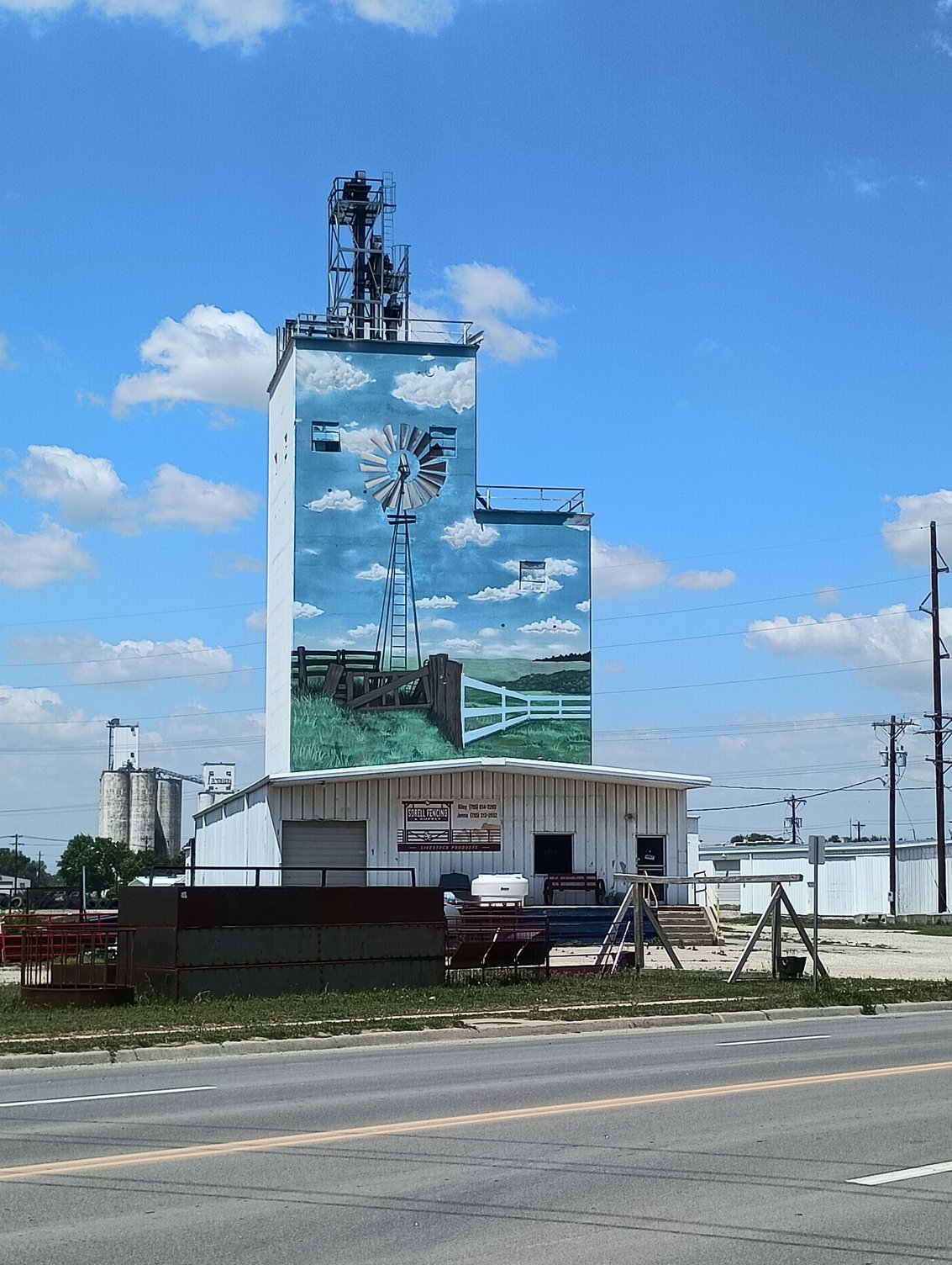 I thought it was cool how today's clouds match the painting on the grain elevator.