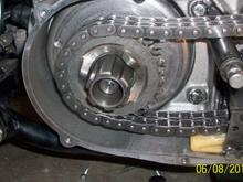 Drive sprocket in place. Please note chain deflection up and down per service manual. I just bolted the tensioner back where it came off.