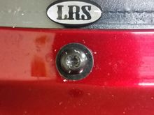 I'm needing help finding a cover for these windshield bolts. Not wanting to do the whole strip thing across the lower part of the shield. Any suggestions?