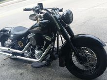 Final rendition black front sliders, black headlight trim, re-badged tank 110th anniversary