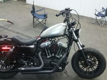 Well i started my wire tuck, ignition and coil relocation this evening but didn't finish. I couldnt find my tape or zipties. Imagine that! But i set my tank to check out how she would fit and i like it. I have a question though. Directions say to seal the tank which i will, but it says to have it pressure checked also. Where can i have it pressure checked at? Oh, just noticed the reflector on the back. Its gotta go.