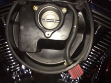 Then took a 5/16 hose to snuggly fit over the air cleaner tube and placed a 1/4 to 1/2 barbed union about halfway down, and attached a piece of 3/8 to fit over the breather inlet which is placed at about the 5 o'clock position on the air box.