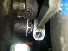 shifter lever attached to the shifter shaft. I did spray some WD 40 to clean the area a bit. 