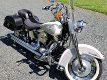 My new ride is a 1994 Heritage Softail Special FLSTN. Owned multiple other brand bikes, cruisers, not crotch rockets. Traded in a Can-am Spyder RT Limited and got my first Harley. It has just over 8000 miles, came with original seat and saddlebags. Removed original saddlebags and put on larger Viking bags. Has Cobra Speedster Slashdown exhaust, Mikuni carb kit and Screamin' Eagle 8000 rpm ignition module. Fat Boy style rims. Original flawless paint. Runs exceptional.