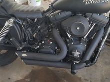 The right side. I assume the o2 sensor from the rear cylinder gets ran almost straight up to connect to the TT. Once again now i just have to figure how to connect TT. 