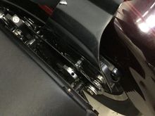 The knobs are hex shaped so I drilled holes in every other side.  The knobs are safety wired to the mount, that is bolted to the bags, so even if they totally unscrewed on the road, I would not lose them, nor would the bag come off.  It would just flop a bit.