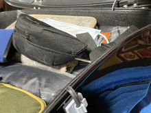 Orientated the wire through the tour pack liner and out the front, and under the seat. 