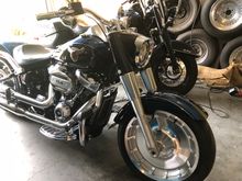 Added Willie G floorboards, brake, and clutch pedals.  HD mustache bar engine guard, and a new black HD nacelle (the cover around the headlight). I really like the black nacelle, it flows better with the black paint visible from the side of the bike and the chrome headlight trim makes it pop. 