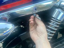 Screw needs to come out through this hole from inside the fender 