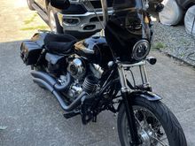 I’ll join in, 2008 fxdc with a frankenfairing. Memphis shades gauntlet with a laminar lip bolted on. Made my own .250” rubber shims for in between and covered that awful laminar lettering with black 3m reflective tape.