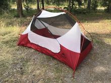 MSR two person tent… Not enough room to stand up, but enough room for one person and all their gear… The vent on the top is very good for warm nights where you can sleep felt a fly…