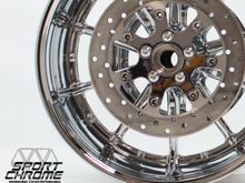 Harley Breakout chrome rear wheel with mirror polished disc.