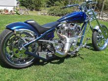 I know this is *off topic* and doesn't pertain to
 H-D wheels,but these were designed by ME on my MAC  CAD system computer,sent to *MILLENNIUM MACHINE & TOOL* in Salinas Kansas to be made from T6T USA Forged Aluminum and then Chromed and custom bearings installed on my 150 C.I. S&S 50th Anniversary Motor with BAKER DRIVETRAIN Transmission and complete primary .This is a ground up build with ZERO" Backbone Stretch and ZERO " up tubes to make the bike small and light .34 degree rake