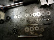 Rebuilding a HD-159 Ohlins shock before cleaning the shim stack.  Look at the dirt.