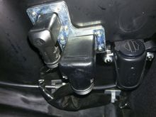 Boom amp connector and aux power port installed in aft right saddle bag with quick disconnects on outside of bag.