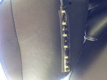 This pod of lights are under the arm of the backrest to illuminate the inside of the saddle bag.