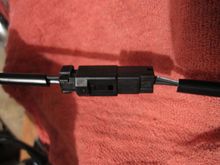 If you look closely can see jumper supplied w/Kahuna grips has a black wire and a black w/white stripe (left side) and the black wire connects to white coming from left grip, while black/wht strip connects to black wire...??