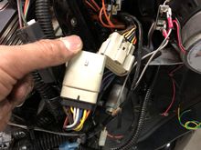 This is the connector to the right of the radio that I would pull the wires from to use the PTT switch.