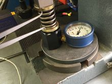 Checking the spring tension at the measured installed height as well as at full lift