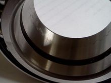 This is a double row bearing and as you can see it has a seperate race for each row of balls.