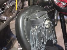 on my softail i just used a handlebar mount, turned it sideways and clamped it to the passinger foot peg