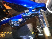 chrome caliper bracket, and the calipers are getting powder coated blue like frame