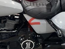 I installed my dimmer switch here.  There’s a threaded mounting hole on the front side of this side of the frame.  Basically the wires are running down the backbone then down to the front frame tubes to the crash bar.  It simplified it quite a bit instead of running up the bars or fairing.