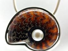 Ammonite shell and cultured pearl set in sterling silver