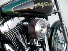 Modified Air Filter Cover
Info here: http://www.hdforums.com/forum/dyna-glide-models/61326-free-mod-air-filter-cover.html
